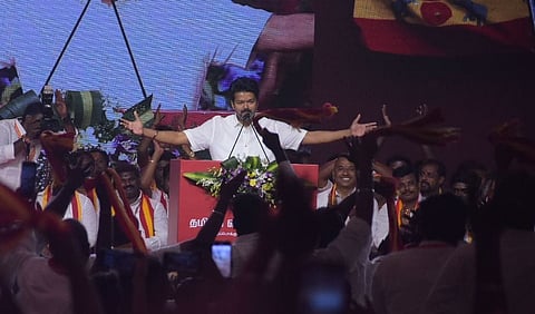 TVK president Vijay addresses the crowd during party's second anniversary held at Mahabalipuram.