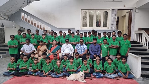 Sarath Kumar Puppala with his team and children