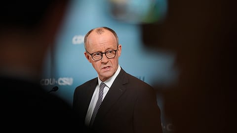 Friedrich Merz, leader of the Christian Democratic Union, CDU, speaks to media prior to a faction meeting of the Christian Union party's lawmaker at the Bundestag in Berlin, Germany, Tuesday, Feb. 25, 2025.