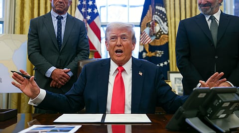 US President Donald Trump speaks to reporters in the Oval Office at the White House in Washington, Tuesday, Feb. 25, 2025.