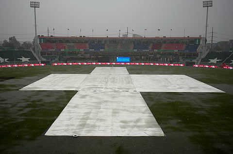 The pitch and ground covers as heavy rain falls ahead of the ICC Champions Trophy match between Pakistan and Bangladesh in Rawalpindi, which was abandoned (Photo | AP)