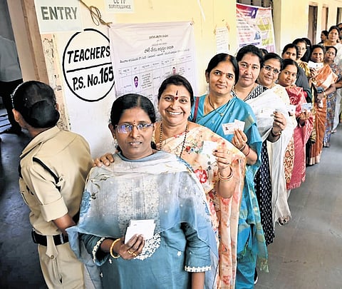 Teachers and Graduates stand in queue to cast their vote in Graduate MLC polls