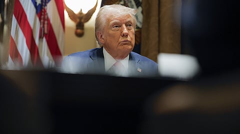 President Donald Trump listens during a Cabinet meeting at the White House in Washington, Tuesday, Feb. 26, 2025.