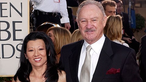 Actor Gene Hackman arrives with his wife, Betsy Arakawa, for the 60th Annual Golden Globe Awards.