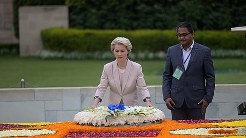 European Commission President Ursula von der Leyen offers her tributes at Rajghat, Mahatma Gandhi memorial, in New Delhi on Thursday.
