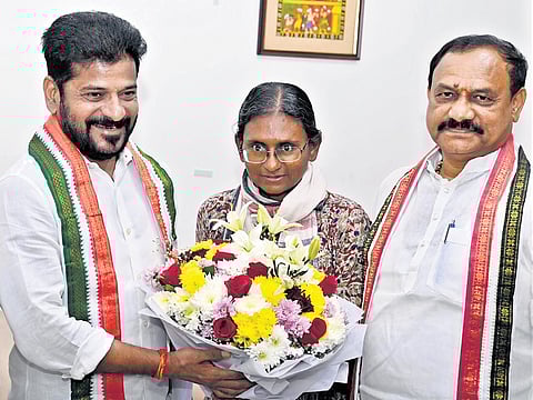 Chief Minister A Revanth Reddy and TPCC president B Mahesh Kumar Goud welcome Meenakshi Natarajan, the newly appointed in-charge for Telangana, on Friday