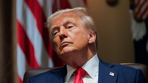 President Donald Trump listens during a Cabinet meeting at the White House in Washington, Wednesday, Feb. 26, 2025.