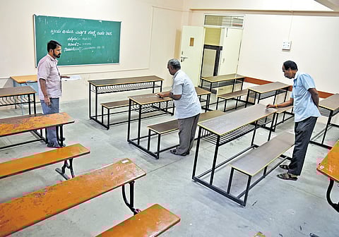 Preparations underway at a PU II examination centre in a college in in Bengaluru on Friday
