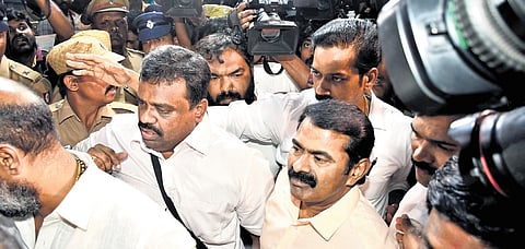 Seeman arriving at the Valsaravakkam police station in Chennai in connection with a sexual assault case on Friday