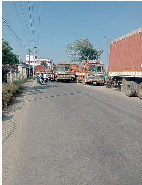 Since there are no truck terminals to park at, drivers park the trucks on congested roadsides