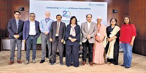 Biocon Group chairperson Kiran Mazumdar-Shaw, Bengaluru Rural MP Dr Manjunath and others at a programme to celebrate 20 years of Biocon Foundation in Bengaluru on Saturday