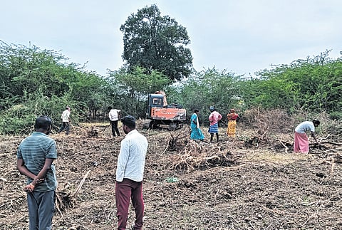 Villagers work together to restore Belahoda Lake, which dried up two years ago