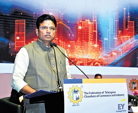 IT Minister D Sridhar Babu speaks during the inauguration of a summit held by FTCCI at the HICC in Hyderabad on Saturday