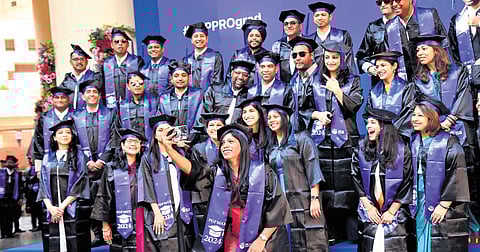 ISB students pose during the graduation ceremony in Hyderabad on Saturday