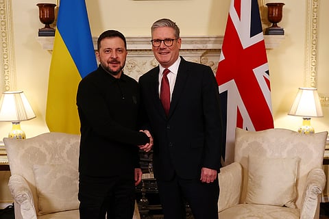 Britain's Prime Minister Keir Starmer, right, greets Ukraine's President Volodymyr Zelenskyy, left, for a meeting at 10 Downing Street in London, England, Saturday, March 1, 2025.
