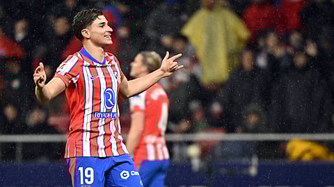 Atletico Madrid's Julian Alvarez celebrates scoring the opening goal during the Spanish league footbal match between Club Atletico de Madrid and Athletic Club Bilbao at Metropolitano Stadium in Madrid on March 1, 2025.