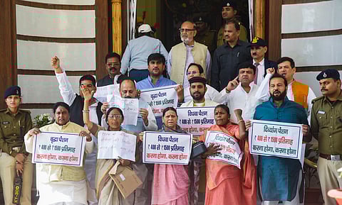 RJD leader Rabri Devi with others stages a protest against the Bihar government during the Budget session of the state Assembly, in Patna, Monday, March 3, 2025.