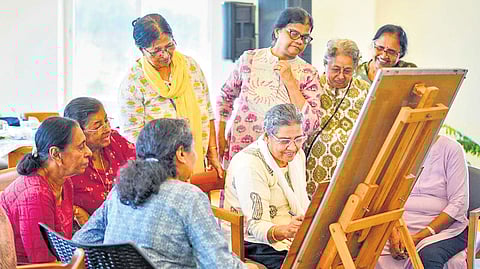 Mallika imparts painting lessons to her friends at Bless Retirement Living