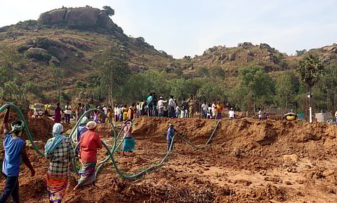 Over 100 people gathered at the construction site on Tuesday morning and staged a sit-in protest, demanding an immediate halt to the use of lake water.