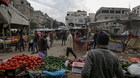 Palestinians shop at Sheikh Radwan Market, west of Gaza City, before the Iftar, the fast-breaking meal, during the holy month of Ramadan on Monday, March 3, 2025.