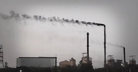 A factory emitting black smoke in Koppal, Karnataka