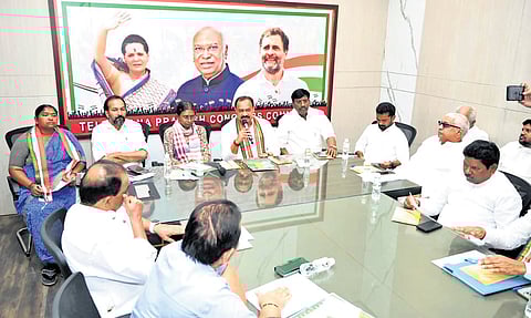 TPCC chief Mahesh Kumar Goud speaks as AICC Telangana in-charge Meenakshi Natarajan looks on during a meeting at Gandhi Bhavan in Hyderabad on Wednesday