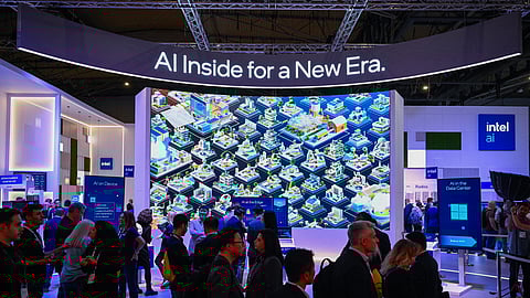 AI signage is displayed at the Intel stand at the MWC (Mobile World Congress), the world's biggest mobile fair, in Barcelona on March 4, 2025.