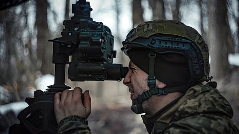 A Ukrainian serviceman prepares to fire a M777 howitzer towards Russian positions at the frontline near Donetsk, Ukraine, Monday, March 3, 2025.