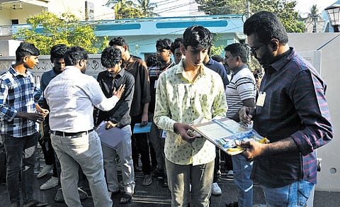 Students go through last-minute preparation on day 1 of the Intermediate examination at AS Rao Nagar on Wednesday;