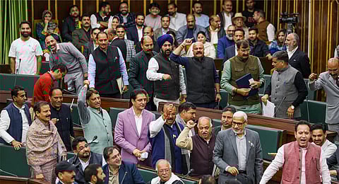 Opposition BJP members walk out from the Jammu and Kashmir Assembly after Speaker Abdul Rahim Rather announced expunging of 'derogatory remarks' of the Leader of Opposition on the July 13, 1931 'martyrs', during Budget session of the Assembly, in Jammu, Wednesday, March 5, 2025.