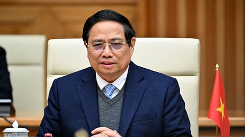 Vietnam's Prime Minister Pham Minh Chinh takes part in a meeting at the Government Office in Hanoi on February 26, 2025.