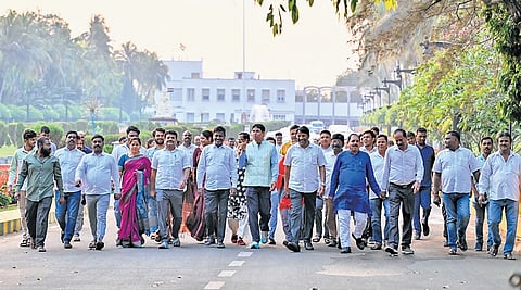 BJD leaders come out of Raj Bhavan after submitting a memorandum to the Governor, in Bhubaneswar on Friday.