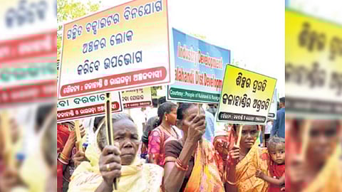 Members of tribal outfits take out rally, seeking operationalisation of Lanjigarh bauxite mines, in Bhubaneswar on Friday.