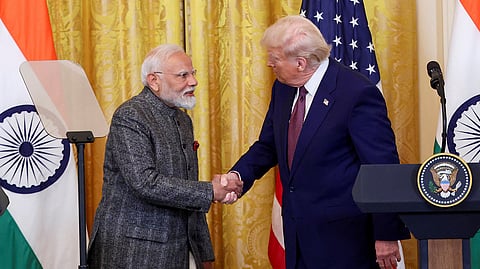 In this photo from Feb. 14, 2025, Prime Minister Narendra Modi and US President Donald Trump shake hands as they deliver a joint press statement after their meeting at the White House, in Washington, DC.