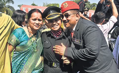 Soni Bisht (centre), who secured the seat at OTA under the Veer Nari scheme, was among the 24 women commissioned into the Indian Army on Saturday