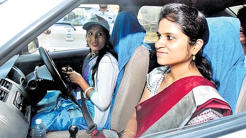 District Collector Valluru Kranthi takes a taxi ride in Sangareddy