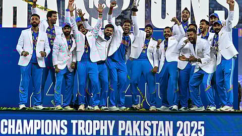 India players celebrate their win over New Zealand in the ICC Champions Trophy final in Dubai on March 9.