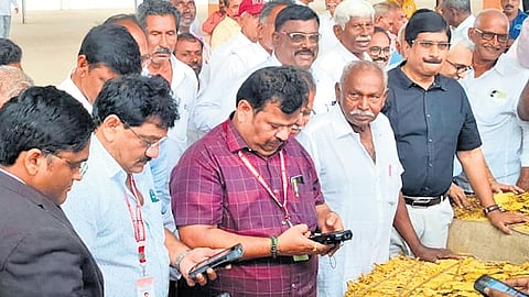 Tobacco Board ED A Sridhar Babu, officials, and traders attend the first day of auctions in Ongole.