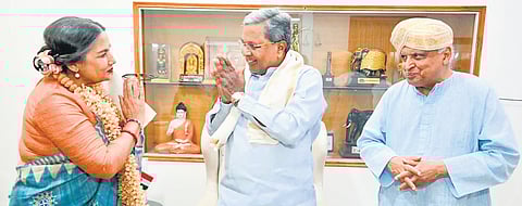 Chief Minister Siddaramaiah greets veteran actor Shabana Azmi, who was chosen for the Lifetime Achievement Award for her contribution to Indian cinema at the 16th Bengaluru International Film Festival, in Bengaluru on Monday. Azmi’s husband lyricist Javed Akhtar looks on