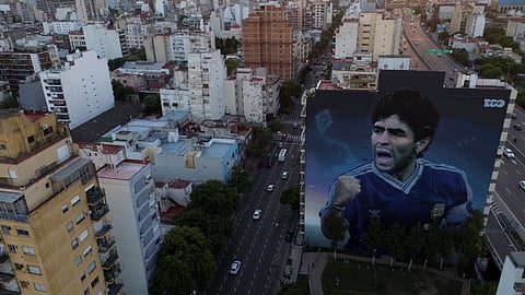 A large mural of the late soccer star Diego Maradona, by artist Martin Ron, stands in Buenos Aires, Argentina, Monday, March 10, 2025.