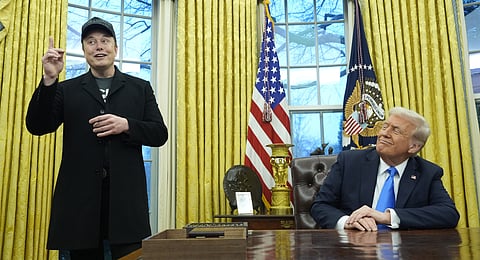 US President Donald Trump listens as Elon Musk speaks in the Oval Office at the White House, Tuesday, Feb. 11, 2025, in Washington.