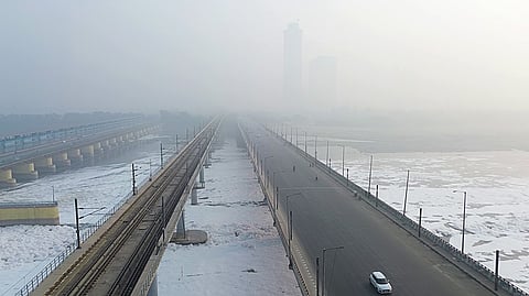 In this photo from Nov. 10, 2024, a dense layer of toxic foam can be seen drifting on the Yamuna River's surface while a thick choking haze hangs in the air as air quality is categorised as 'Very poor', at Kalindi Kunj in New Delhi.