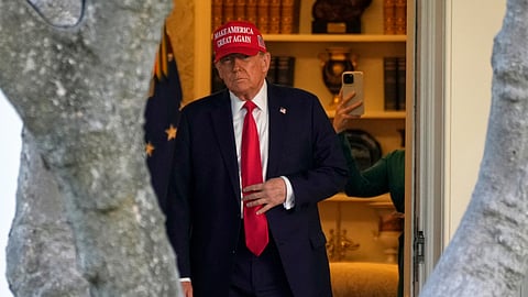 US President Donald Trump walks from the Oval Office to depart on Marine One on the South Lawn of the White House in Washington, Feb. 28, 2025.