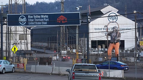 Cars sit parked outside the United States Steel Corporation's Edgar Thomson Plant in Braddock, Pa., on Tuesday, March 4, 2025.