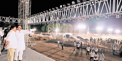 Ministers Nadendla Manohar and Kandula Durgesh inspecting arrangements for the JSP’s foundation day event at Chitrada village of Pithapuram mandal