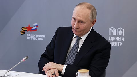 In this photo from March 6, 2025, Russian President Vladimir Putin attends a meeting of The Defenders of the Fatherland Foundation in Moscow, Russia.