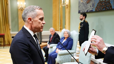 Mark Carney is sworn in as prime minister during a ceremony at Rideau Hall in Ottawa on Friday, March 14, 2025.