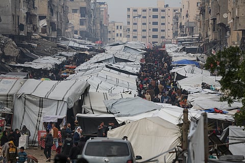 Palestinians shop at Sheikh Radwan Market, west of Gaza City, before the Iftar, the fast-breaking meal, during the holy month of Ramadan.