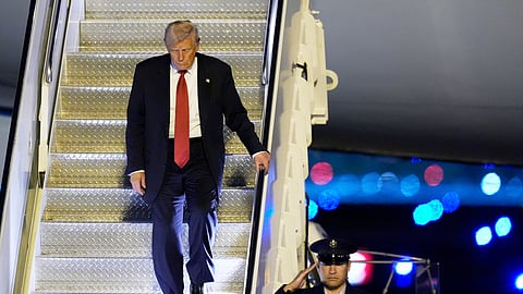 President Donald Trump arrives on Air Force One at Palm Beach International Airport, Friday, March 14, 2025, in West Palm Beach
