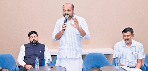 Minister P Rajeeve briefing the beneficiaries about the phase II CIAL rehabilitation package. CIAL MD S Suhas and executive director V Jayarajan are also seen